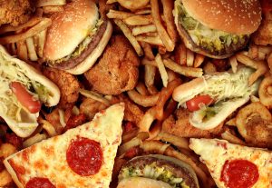 Saturated fats in fast foods leading to elevation in cholesterol levels