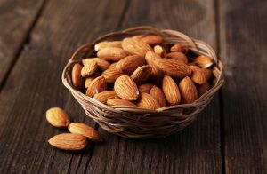 Low calorie almonds in wooden basket