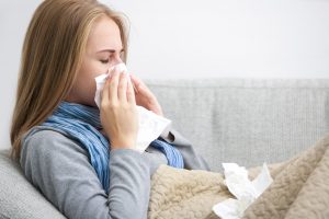 A girl having a cold or the flu
