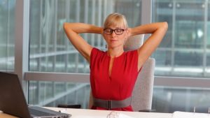business-woman-eyeglasses-relaxing-neck