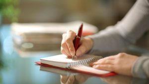 Writing on the notebook