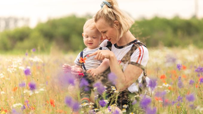 mother-child-playing-field-flowers - How to Be Stress-Free and Happy