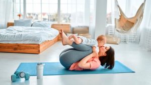 Mother do exercises with her daughter