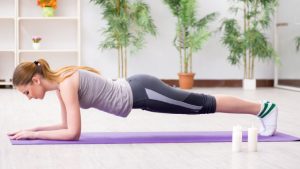 pregnant Woman doing plank exercise