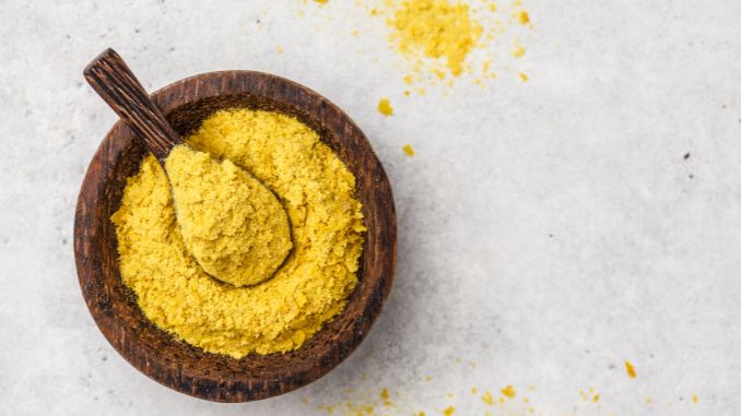 nutritional-yeast-in-a-wooden-bowl